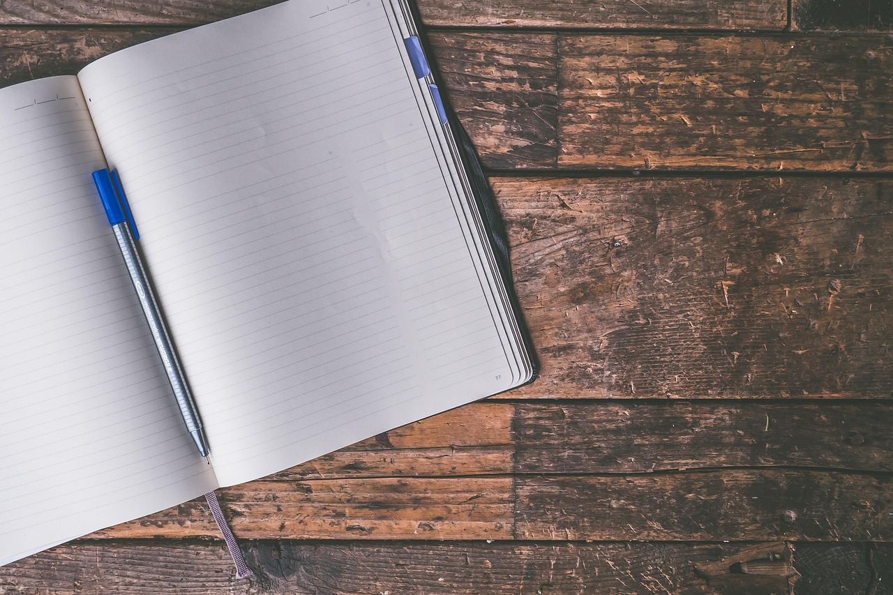 writing notebook laptop